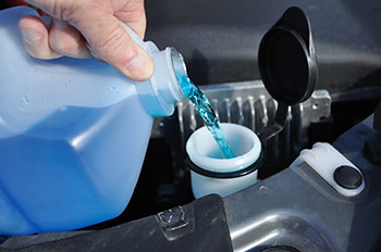 Automobile Maintenance - Filling the Windshield Washer Fluid on a Car